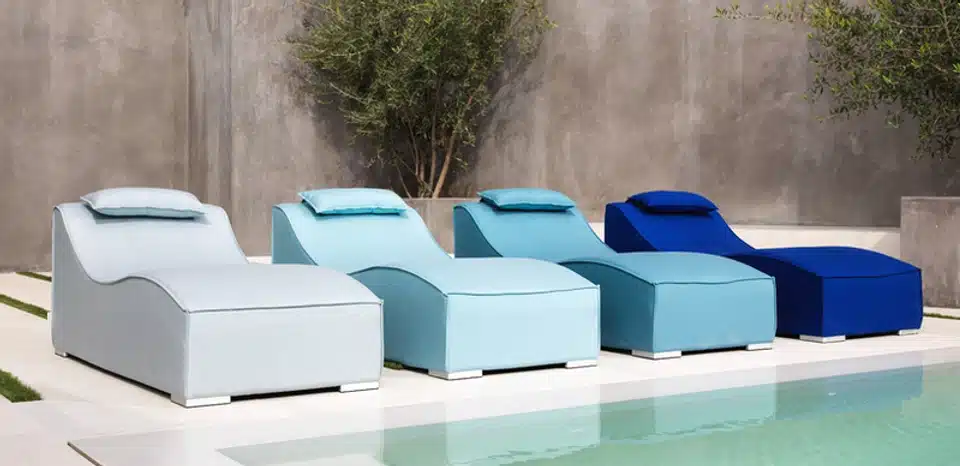 Breeze Lounger Patio Chairs on a pool deck in Calgary