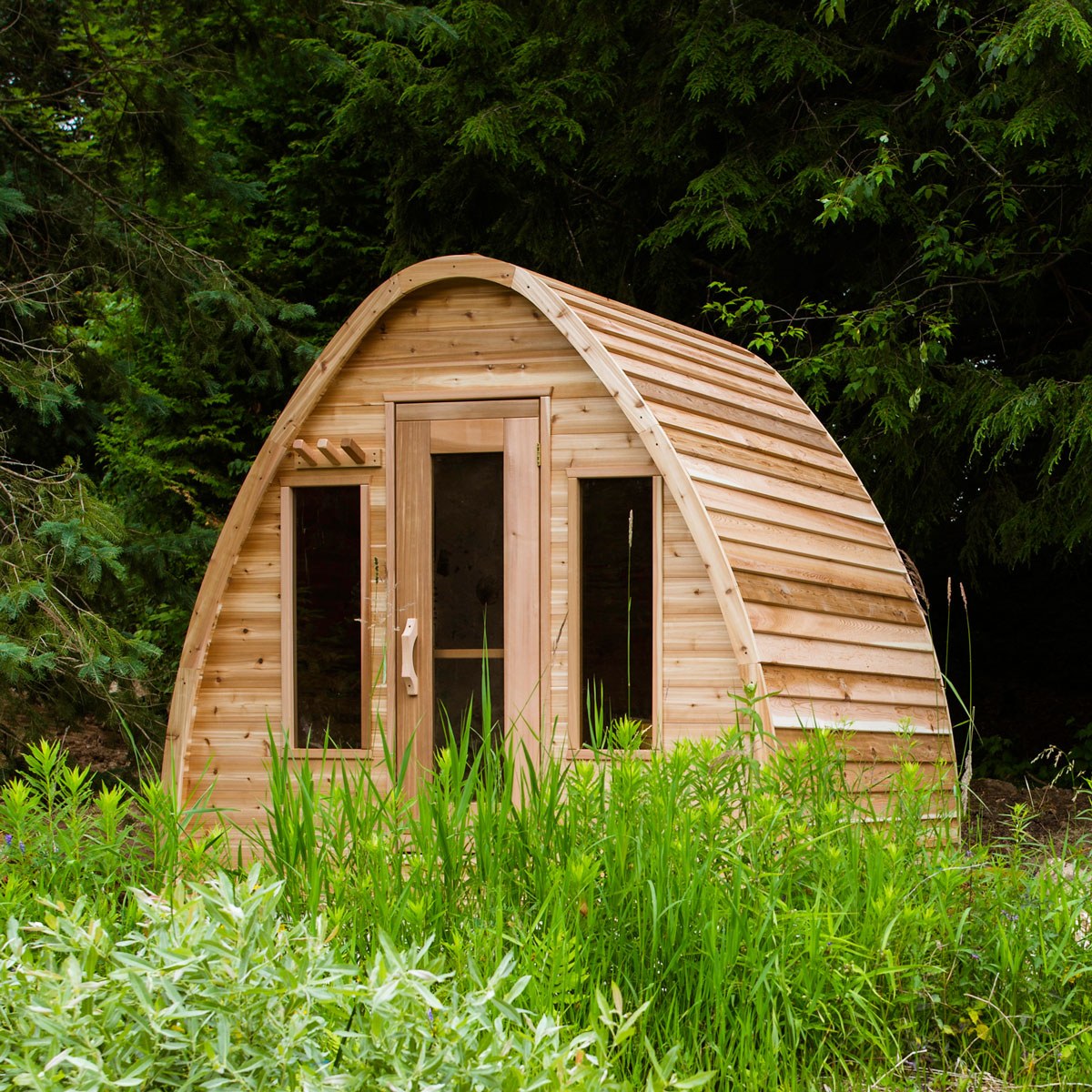 POD Sauna with cedar roof, glass door and optional front windows.